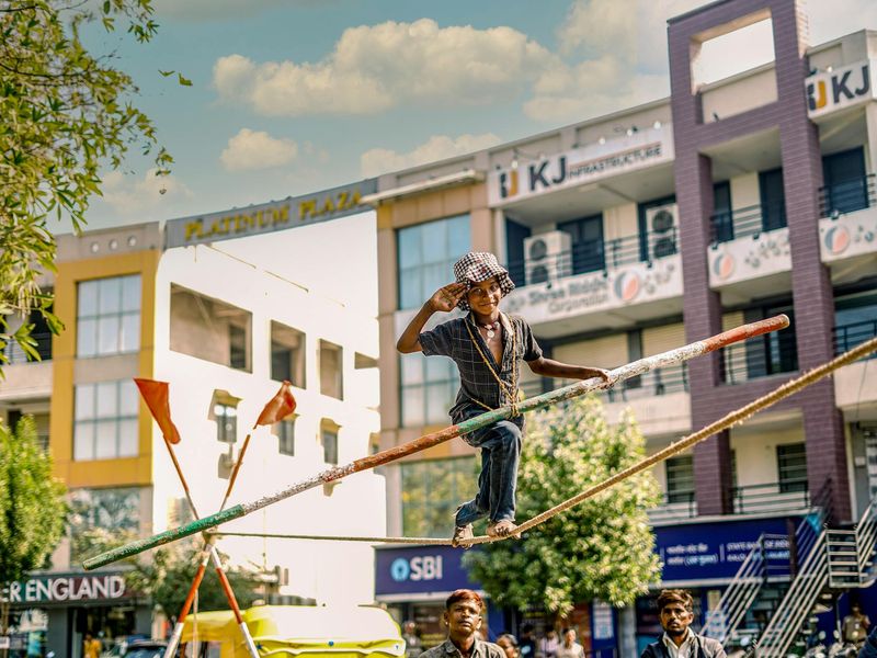 Person performing a sun salutation with focus.